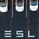 An aerial view shows cars parked at the Tesla Fremont Factory in Fremont, California on February 10, 2022.